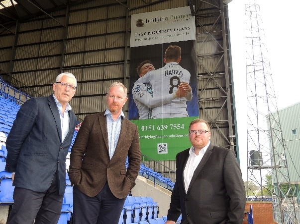 Bridging lender partners with football team